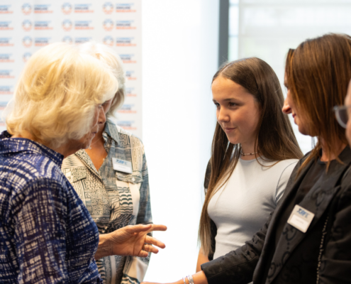 Leanne Carling and daughter Blaire meeting HRH The Queen at JDRF charity event in London